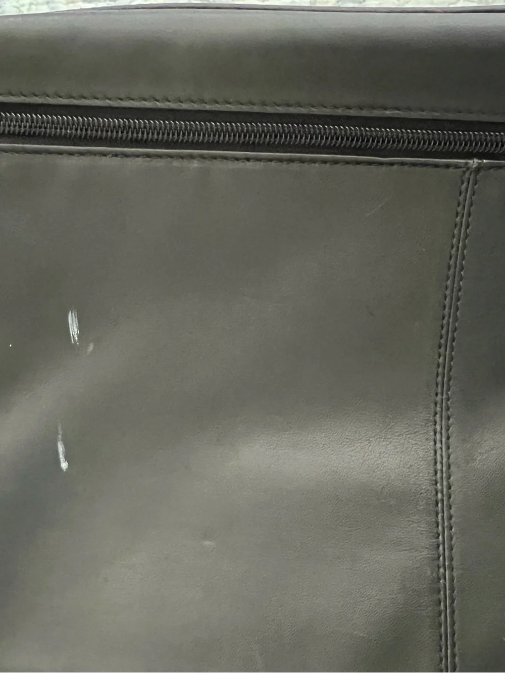 Tumi sleek leather